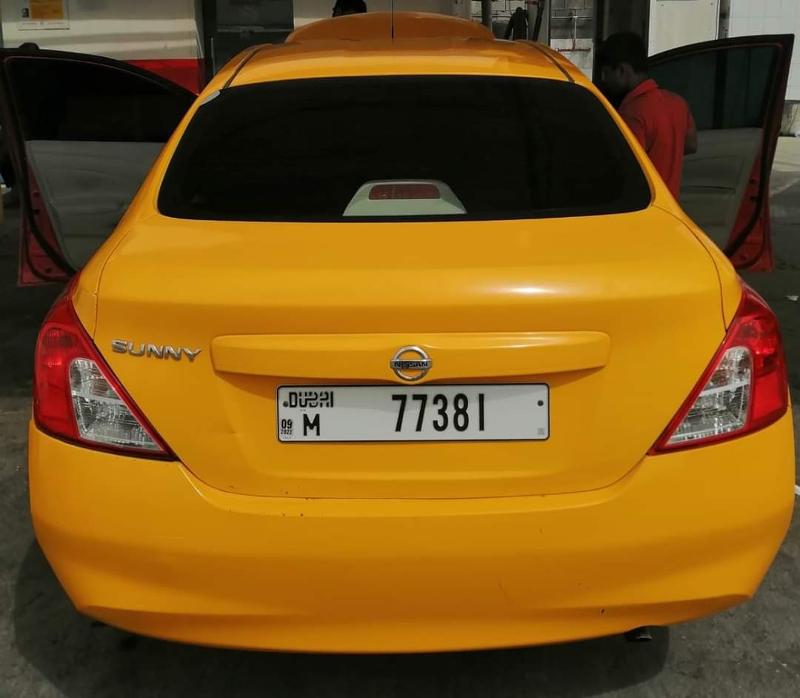 nissan sunny yellow