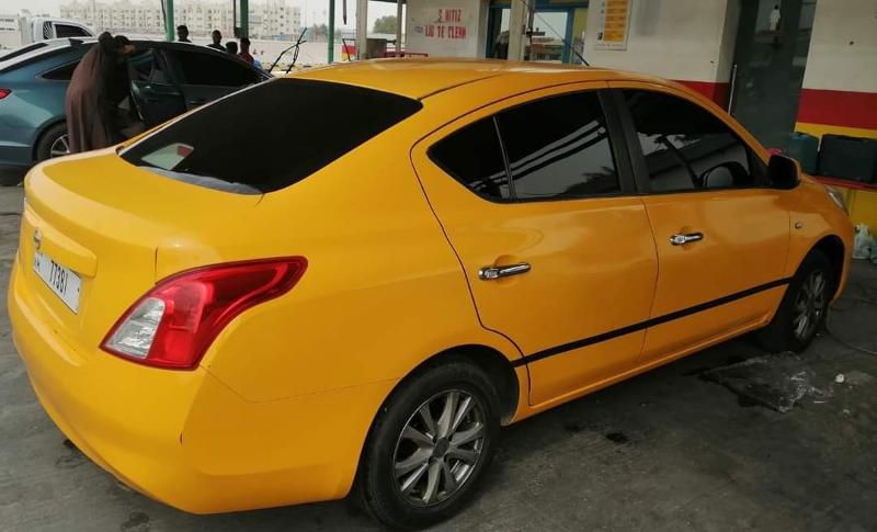 nissan sunny yellow