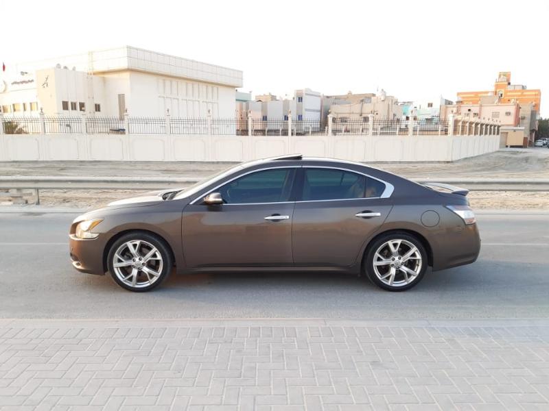 brown nissan maxima