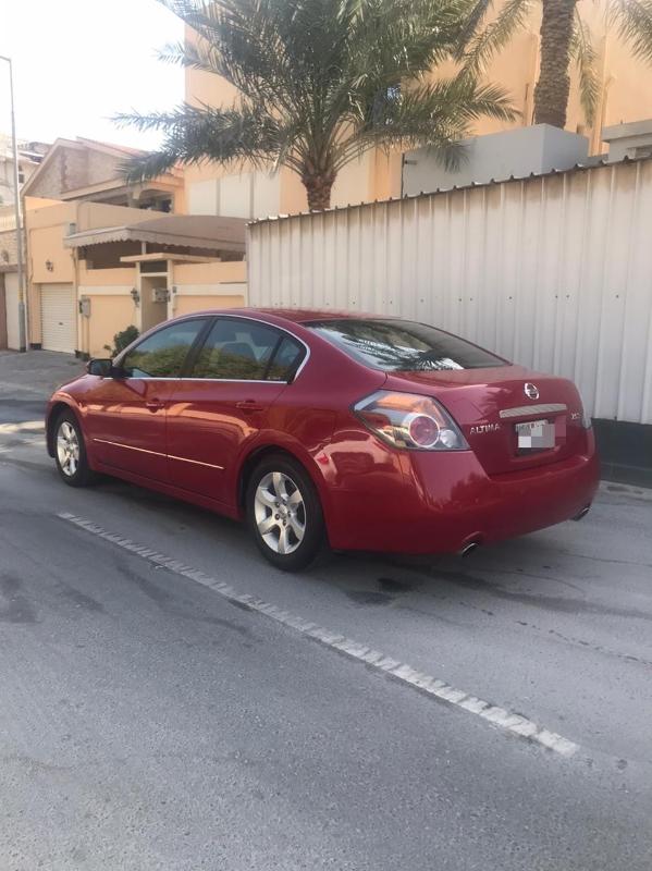 2008 red nissan altima